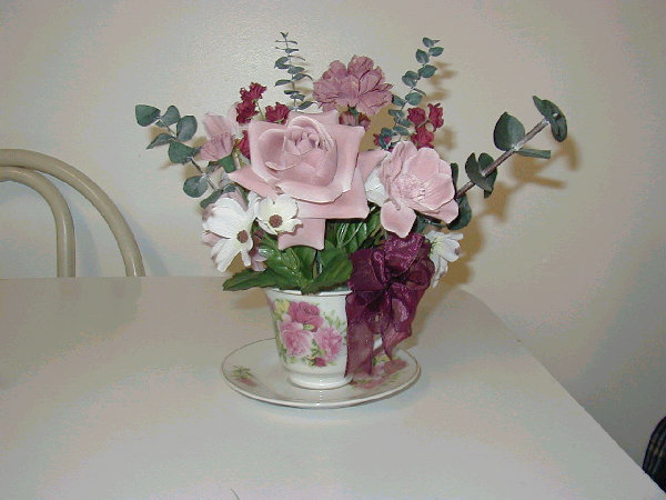 silk flowers, silk, floral arrangements, wall hangings, baskets, interior decorations, flowers, custom made, hand made, wreaths, swags, water cans, tea cups, collectibles, interior decoraters, artifical plants, artifical flowers, fake plants, fake flowers